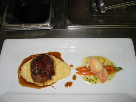 Le Québécois Grain Fed Veal Tournedo Wrapped in Bacon with Butter Poached Canadian Lobster,<br /> Creamy Polenta and Glazed Fall Vegetables